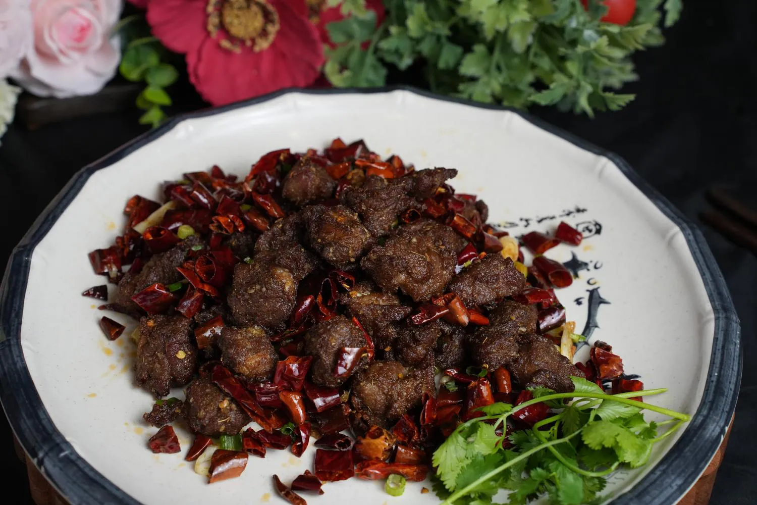 Spicy fried beef cubes with dried chili peppers at Dumpling Party Hunan Cuisine, a Chinese Restaurant in Sugar Land